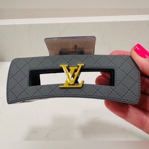Gray Hair Clip with LV Gold Accent.